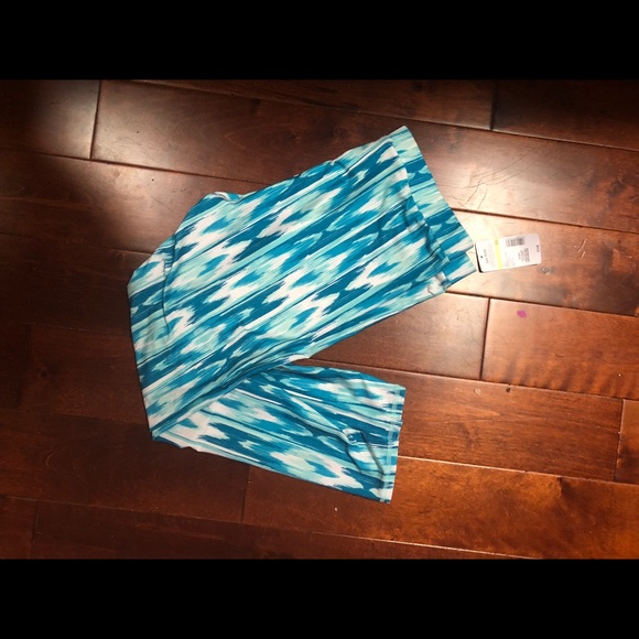 Two pairs of ankle-length exercise leggings. - Picture 2 of 4